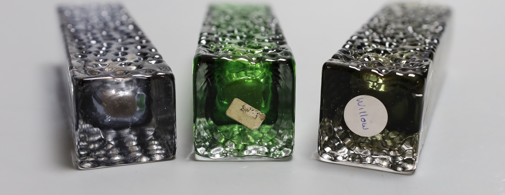 A trio of Whitefriars 'Nailhead' vases, model 9683, designed by Geoffrey Baxter, various colours, 17cm high.
